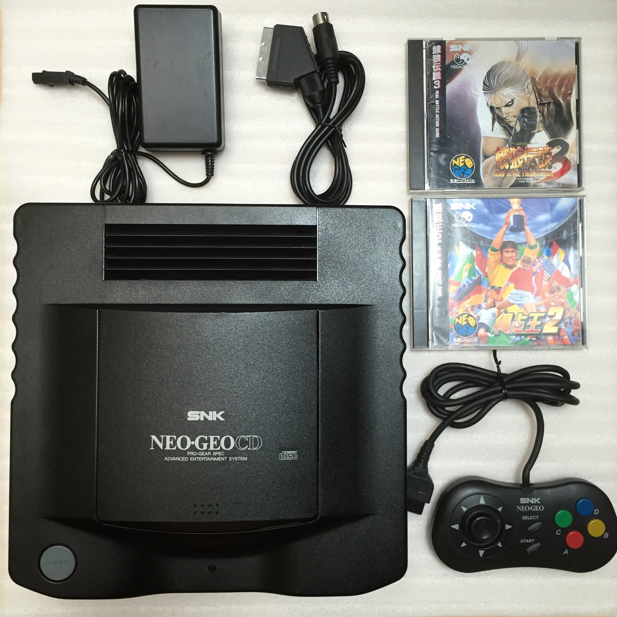 NeoGeo CD System + 2 games and RGB cable set