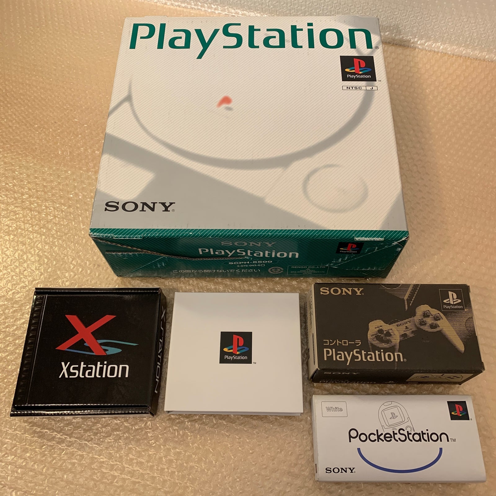 Boxed PS1 set with PS1 Digital and X Station