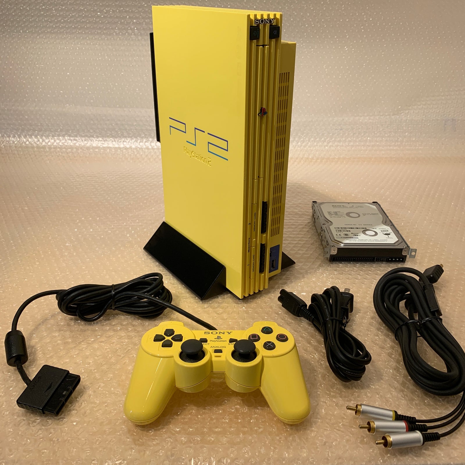 Yellow "European Automobile" PS2 set - Region free