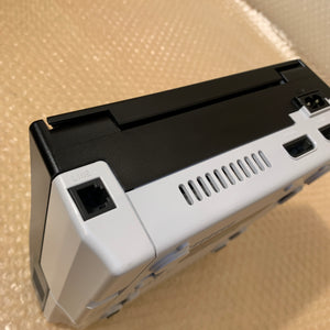 Region-free Dreamcast set with official black top case