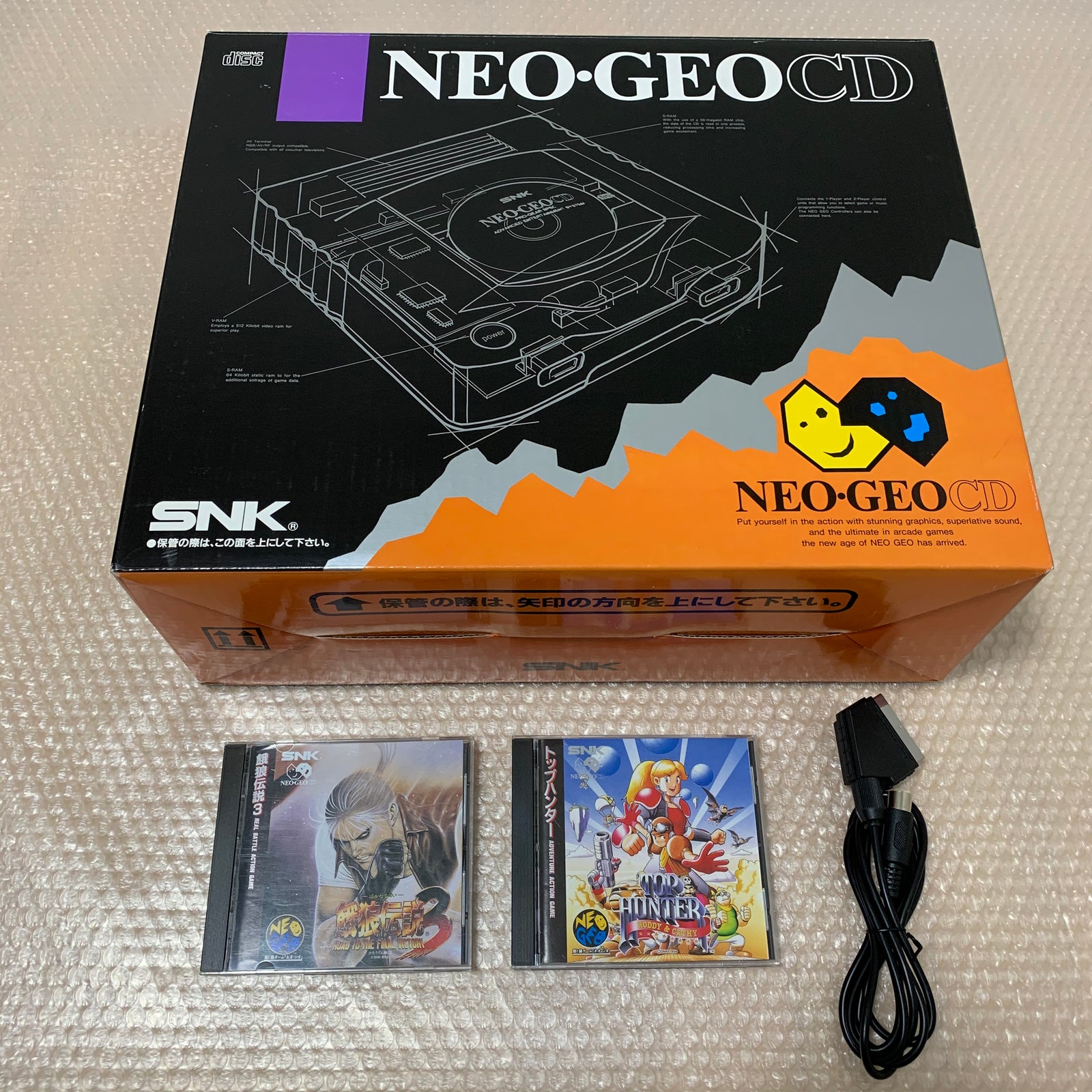 Boxed NeoGeo CD System + 2 games and RGB cable